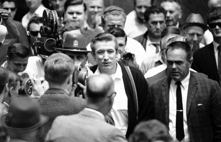 Richard Speck is surrounded by newsmen when he leaves the Peoria County Court House
