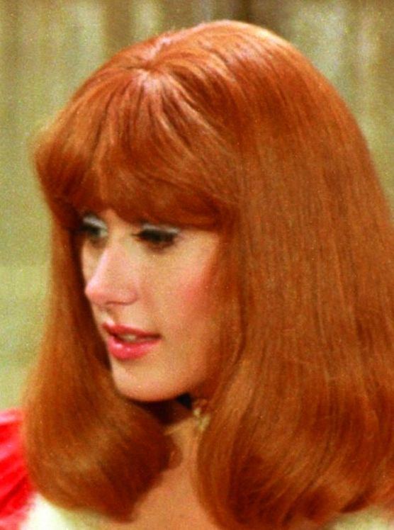 Robyn Hilton with her reddish-brown hair in a movie scene from Blazing Saddles (1974)