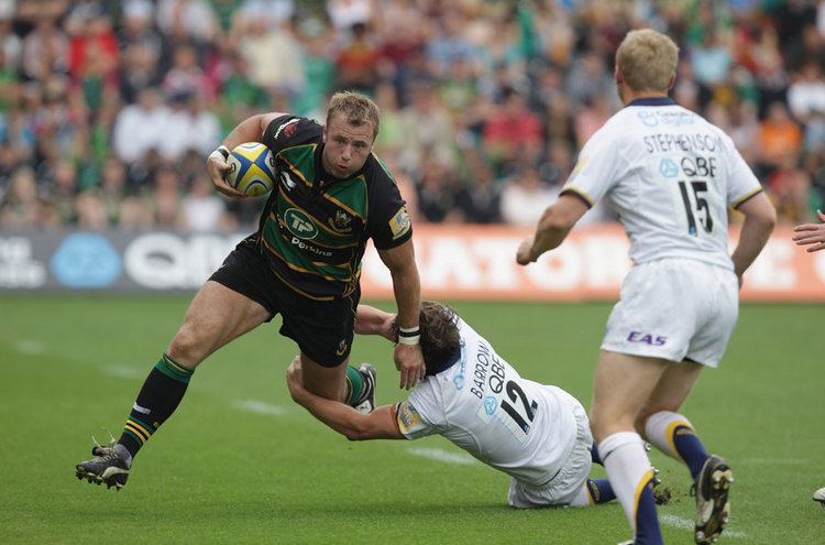 Roger Wilson (rugby union) Northampton No8 Roger Wilson evades Scott Barrow Rugby Union