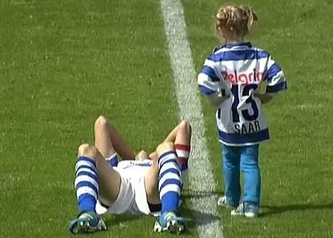 Rogier Meijer Footballer cries after losing match and is consoled by