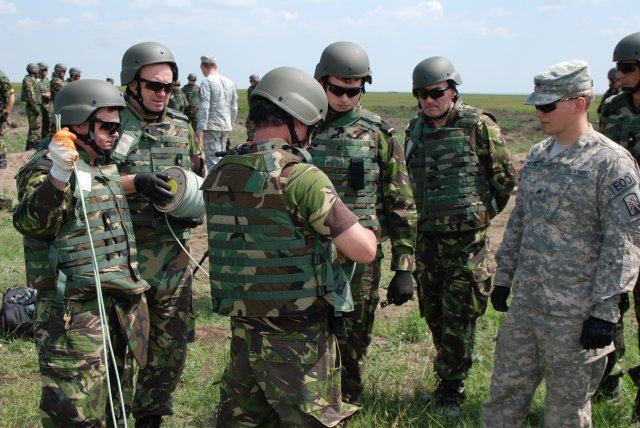 Romanian Armed Forces 21st TSC EOD techs help Romania Armed Forces destroy excess