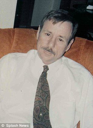 Ronald Dickson Woodroof with a mustache, wearing white long sleeves with a tie.