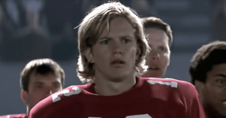 Kip Pardue as Ronnie Bass wearing a red football jersey in a movie scene from the 2000 film Remember the Titans