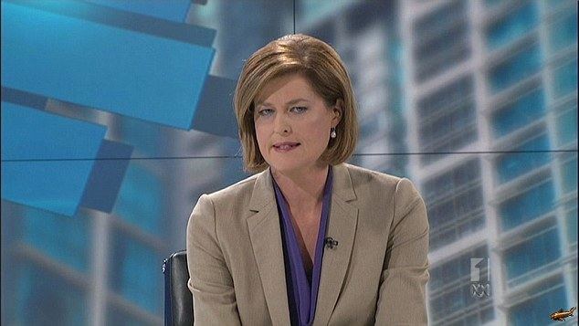 Ros Childs reporting for ABC News 24 with short blonde hair and wearing a purple blouse under a brown coat and pearl earrings