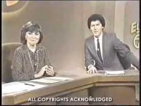 Eyewitness News correspondent Rose Ann Scamardella wearing long sleeve blouse while Ernie Anastos wearing a coat, long sleeve, and necktie