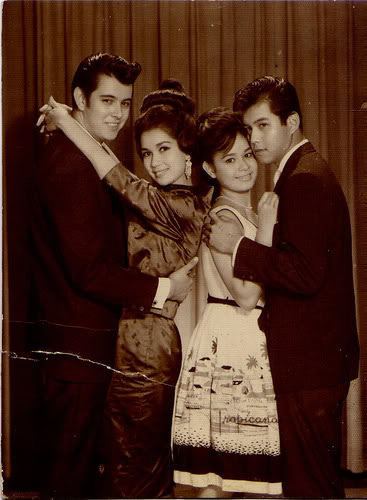 Eddie Gutierrez smiling with Susan Roces and Rosemarie Sonora smiling and standing next to Ramil Rodriguez