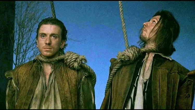 Rosencrantz %26 Guildenstern Are Dead (film) movie scenes The scales of Justice appear in a humorous scene in which Rosencrantz or is it Guildenstern seeks to demonstrate that a heavy ball and a feather will 