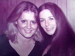 Rosie Nix Adams smiling in a short hair with her mother June Carter Cash