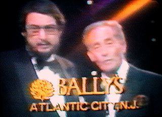 Roy Radin and Joey Bishop wearing black coat, white long sleeves and bow tie