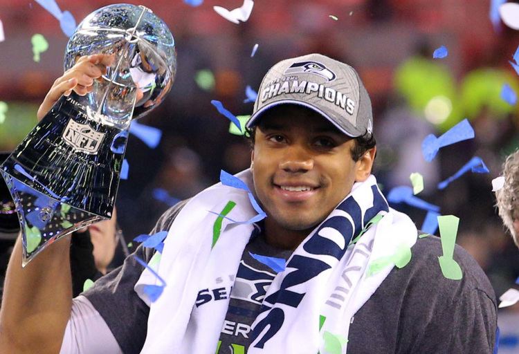 Russell Willson Russell Wilson is the thirdhighest paid quarterback on