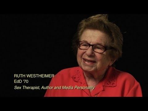 Ruth Westheimer in one of her interviews while wearing eyeglasses and red blouse