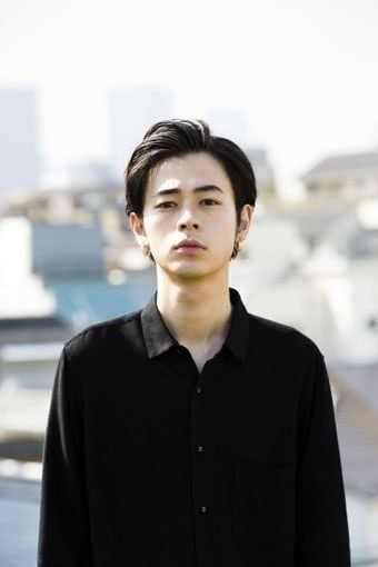 Ryo Narita wearing a black long sleeves