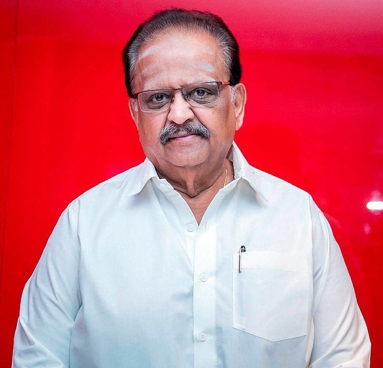 S P Balasubrahmanyam wearing a white shirt and a pair of eyeglasses