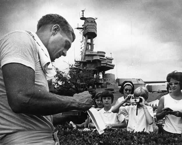 Sand Chronicles movie scenes Actor Steve McQueen signs autographs while visiting the USS Texas to film scenes from the movie The Sand Pebbles August 1966 Richard Pipes Chronicle 