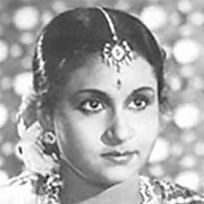 Santha Kumari wearing a headdress