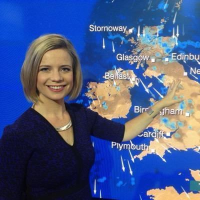Sarah Keith-Lucas smiling while reporting the weather forecast and wearing dark blue blouse and necklace