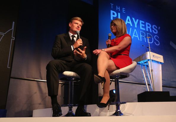 Sarah Stirk talking to Ernie Els on stage at the European Tour Dinner, before the BMW PGA Championship