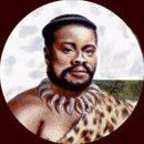 Senzangakhona kaJama, chief of the Zulu clan, with a serious face, with beard and mustache, wearing a bone necklace, and an animal print top.