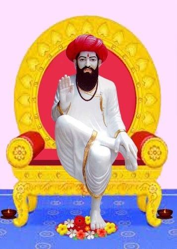 Poster of Sevalal sitting cross-legged on a throne chair, wearing a brown necklace, red turban, and a white robe.