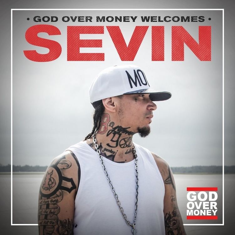 Sevin (rapper) Bizzle39s record label God Over Money signs Sevin