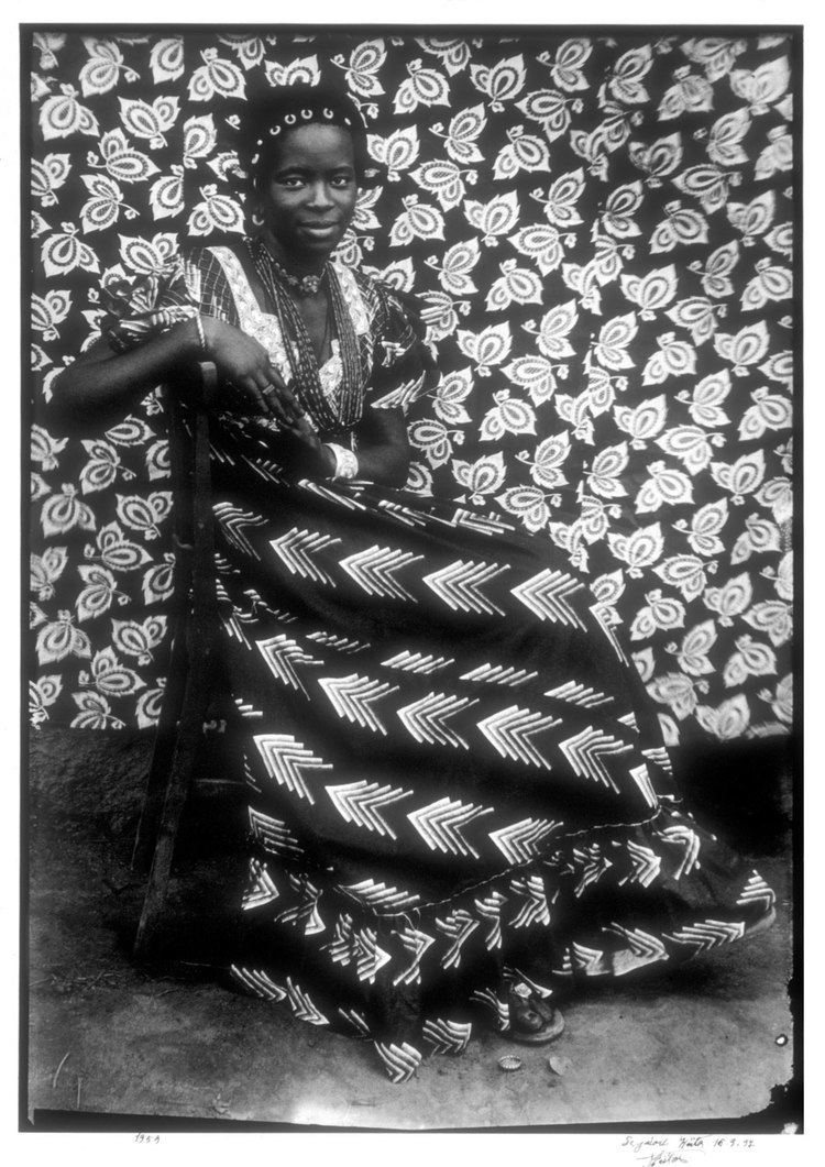 Seydou Keïta (photographer) Untitled Seated Woman with Chevron Print Dress Seydou Keita