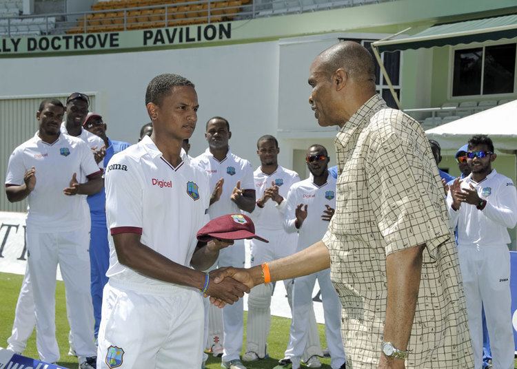Shane Dowrich Shane Dowrich gets his Test cap from Norbert Phillip West