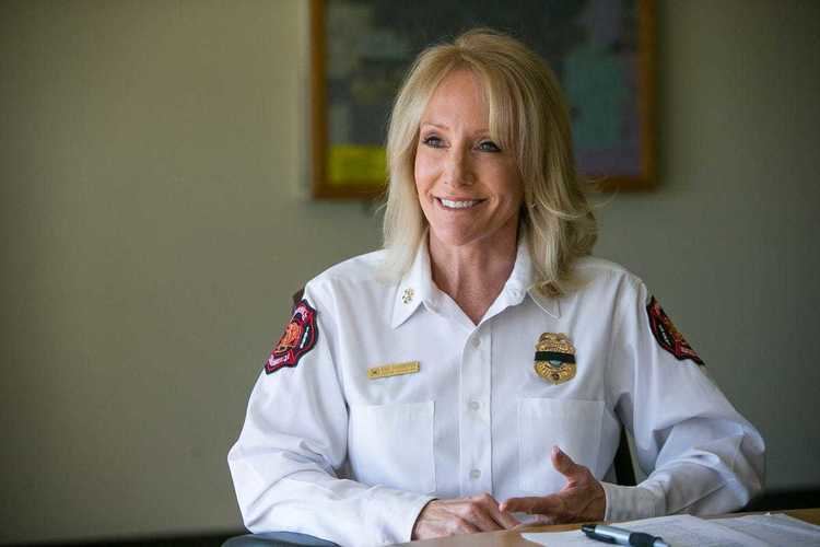 Shelly Jamison wearing her firefighter uniform