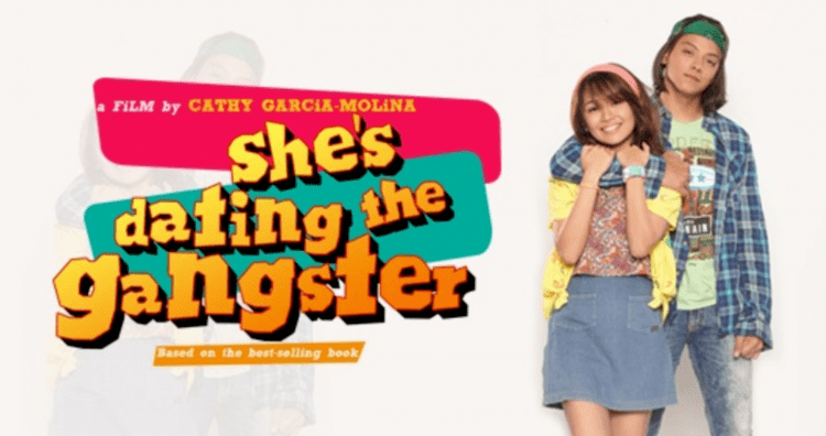 Daniel Padilla holding Kathryn Bernardo from behind in a movie poster "She's Dating the Gangster"(2014 film)