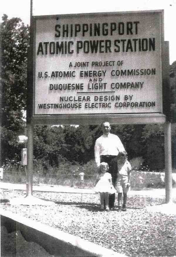 Shippingport Atomic Power Station Tourists pose next to the sign outside of Shippingport Atomic Power