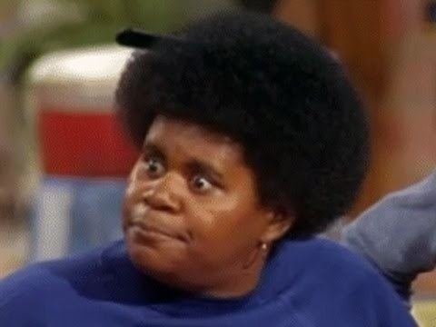 Shirley Hemphill wearing earrings and a blue shirt.