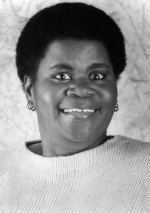 Shirley Hemphill with a smiling face and wearing a white shirt.
