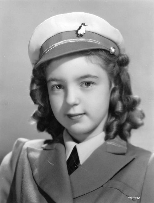 Shirley Mills smiles while wearing a uniform
