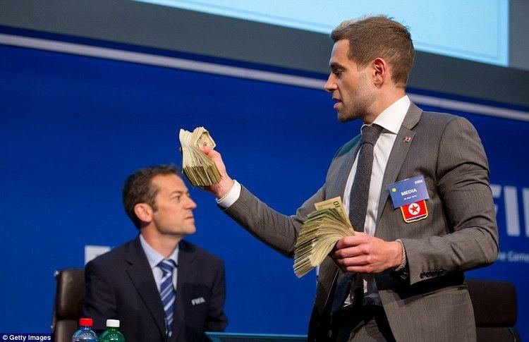 Simon Brodkin Sepp Blatter showered in fake money by comedian Simon