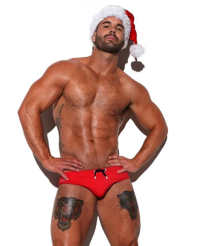 Simon Dunn Gay bobsledder Simon Dunn is Santa in a swimsuit Outsports