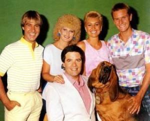 Casts of Simon Townsend's Wonder World with a dog.