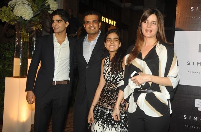 Simone Arora and her family wearing a formal attire