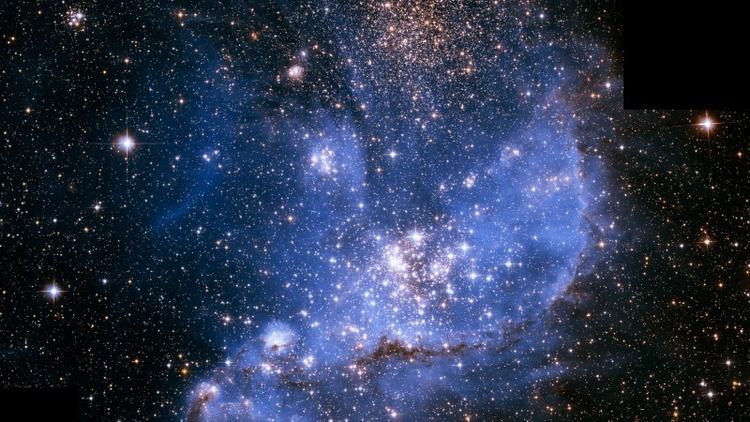 Small Magellanic Cloud Small Magellanic Cloud orbits our galaxy Clusters Nebulae Galaxies