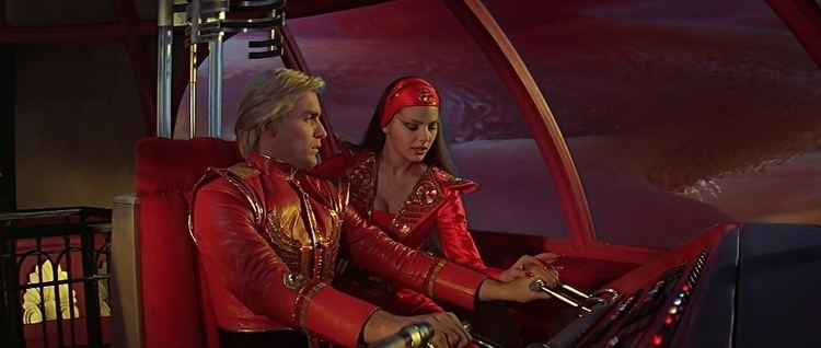 Song Car-Tunes movie scenes Flash Gordon was one of the first films to feature Queen s music and still reigns as the one to do so most prominently Queen composed and performed the 