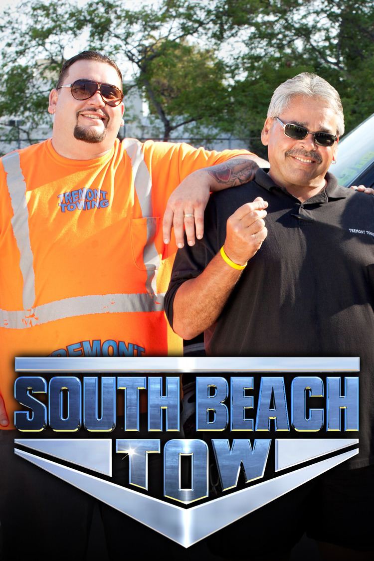 Robert Ashenoff Jr. smiling with Robert Ashenoff Sr. in the 2011 tv series South Beach Tow