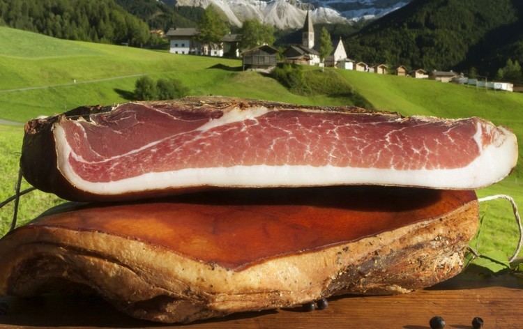 Speck Alto Adige PGI Speck Alto Adige PGI Festival in Valley of Funes Italy