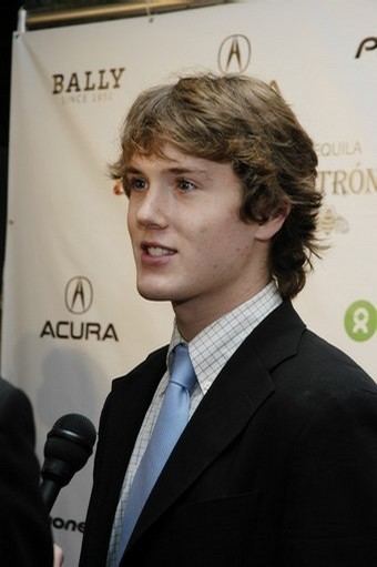Spencer Treat Clark, in one of his interviews, while wearing a black coat, black and white checkered long sleeves, and blue necktie