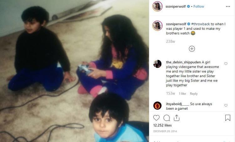 On the left, young SSSniperWolf playing video games while sitting on the floor, with long curly hair together with her brother Paul Shelesh wearing a black sweatshirt and blue pants while Bakir Shelesh looking above and wearing a blue shirt. On the right, SSSniperWolf's Instagram post.