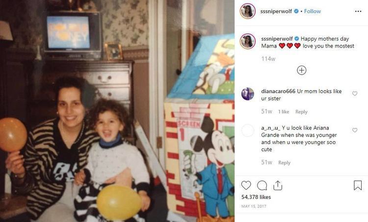 On the left, young SSSniperWolf with her mother Mrs. Shelesh, with a big smile on her face while holding a yellow balloon, with curly hair, and wearing a white and black dress. On the right, an Instagram post of SSSniperWolf greeting a Happy Mother's Day.