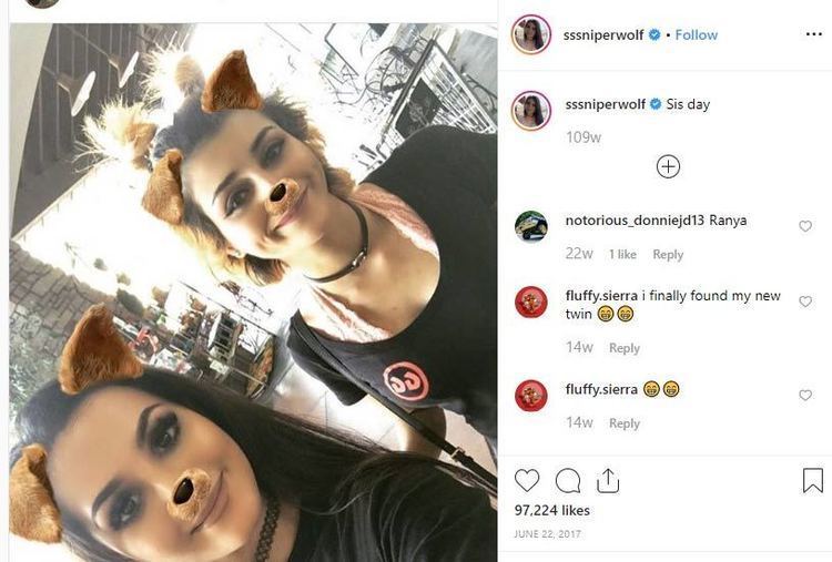 On the left, SSSniperWolf with her sister Ranya Shelesh, both are smiling, with a Snapchat filter on their faces, wearing black chokers and black tops. On the right, SSSniperWolf's Instagram post.