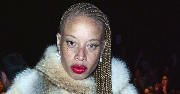 Stacey McKenzie Stacey McKenzie oozes glamour with side braids and red lips