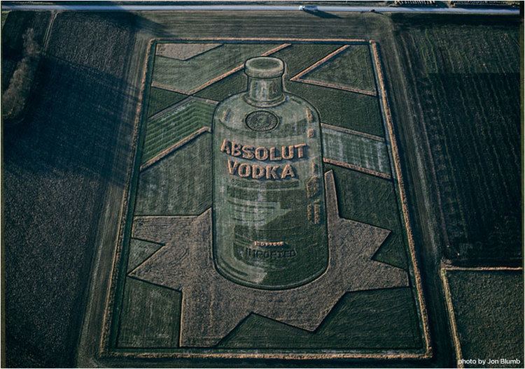 Stan Herd An Absolut ad mowed into green field Photo and crop art by Stan