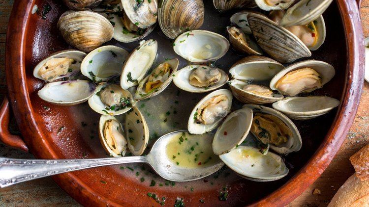Steamed clams Steamed Clams With Spring Herbs Recipe NYT Cooking