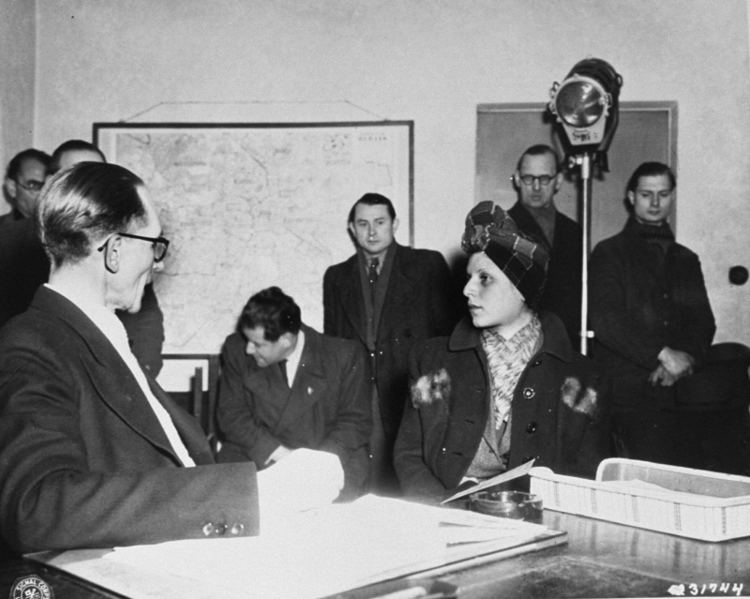 Stella Kübler is being interrogated by police commissioner Jean Blome about her activities during the war