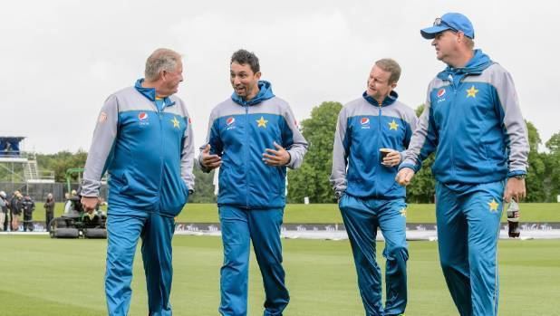 Steve Rixon (left) says issues in Australian cricket have been brewing for together with Mickey Arthur (right), bowling coach Azhar Mahmood, batting coach Grant Flower (middle right) and trainer Grant Luden (middle left). They are wearing a blue jacket and blue pants