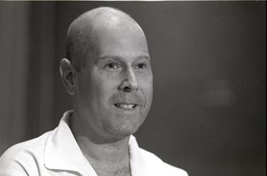 Steven Jay Russell with a smiling face and wearing a white polo shirt.
